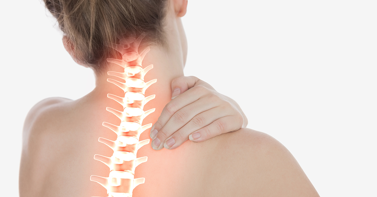 Highlighted spine of woman with neck pain; blog: when to worry about neck pain