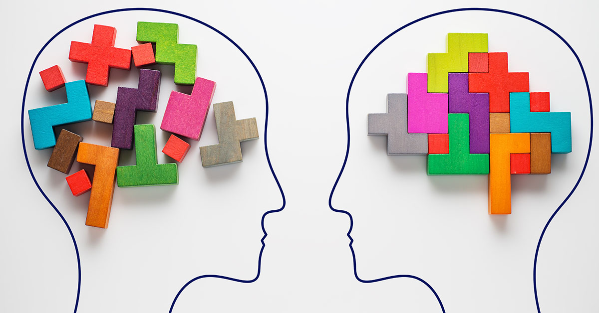 The concept of rational and irrational thinking of two people. Heads of two people with colourful shapes of abstract brain for concept of idea and teamwork. Two people with different thinking; blog: Does Brain Training Work?